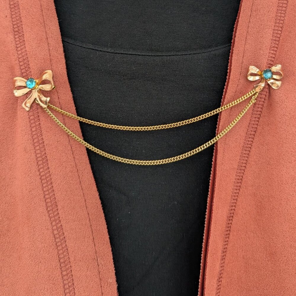 Vintage Van Dell Rose Gold Bow and Blue Rhinestone Sweater Guard